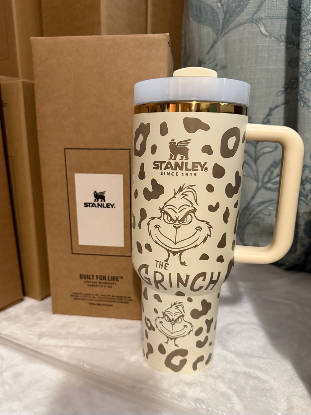 40oz Stanley Cream and Gold Grinch with cheetah print